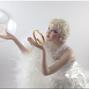 Elegant Porcelain Figurine with Gold Accents